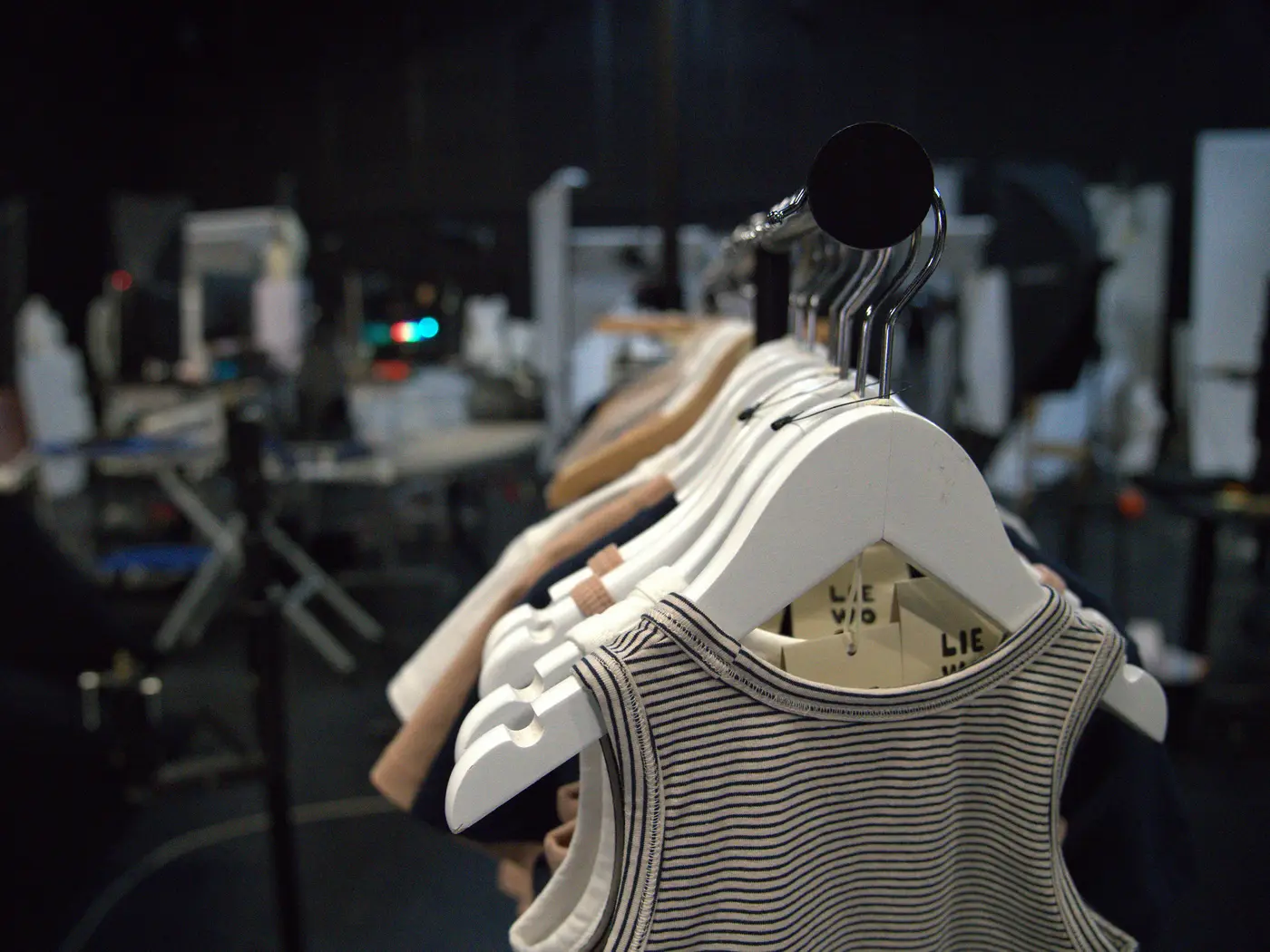 Samples on a clothing rack in the studio, ready for styling and photography - each sample is scanned and tracked